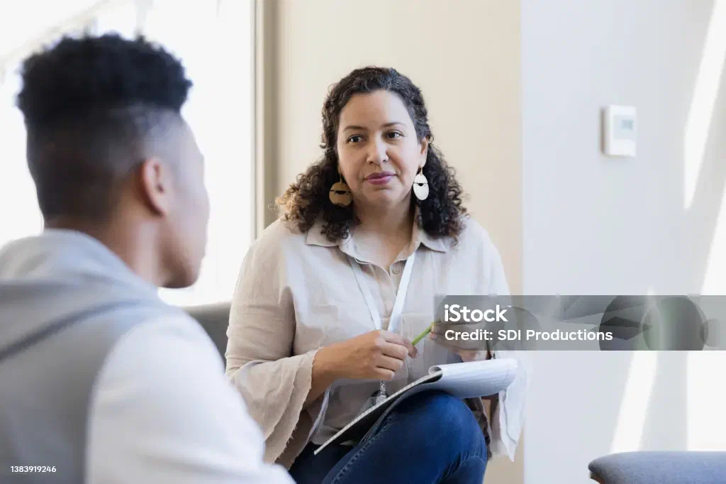 A counselor listening